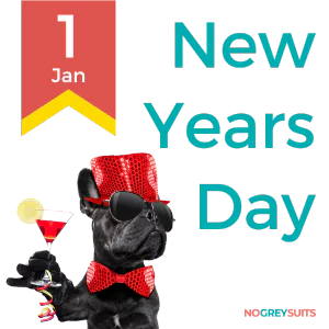 This image features a celebratory graphic for New Year's Day. In the center, there is a stylized black dog wearing a red bow tie and sequined top hat, holding a cocktail glass with a lemon slice. The dog appears to be wearing sunglasses. At the top left, there's a red ribbon banner with '1 Jan' written in white, indicating the date of New Year's Day. The text 'New Years Day' is prominently displayed in the upper right area in white and red font. The bottom right corner includes the text 'NO GREY SUITS' in white font on a black background.