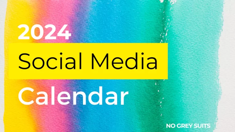 ALT text for accessibility: The image is a vibrant, promotional graphic for a "2024 Social Media Calendar" by NO GREY SUITS. It features a colorful watercolor background with a spectrum of hues from yellow, pink, to blue and green, creating a lively and creative atmosphere. Overlaying the watercolor is bold text in white and black that reads "2024 Social Media Calendar". The phrase "NO GREY SUITS" is positioned at the bottom, indicating the creator or the brand associated with the calendar. The visual is eye-catching and suggests an energetic approach to social media planning.